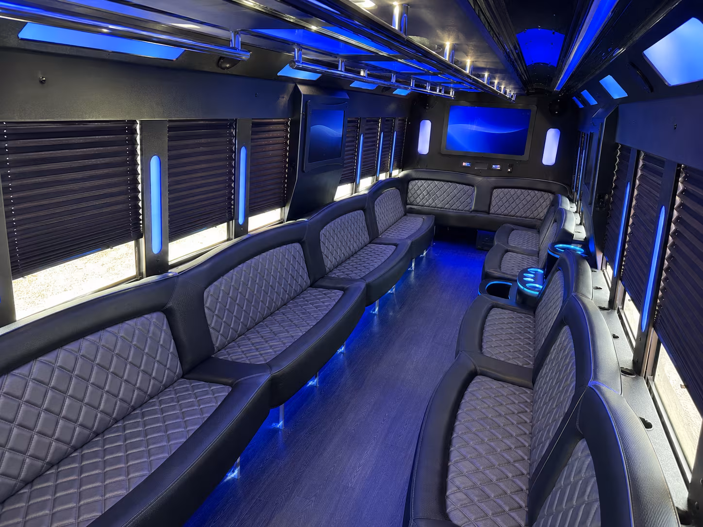 Passenger seating aboard a party bus rental serving Cambridge